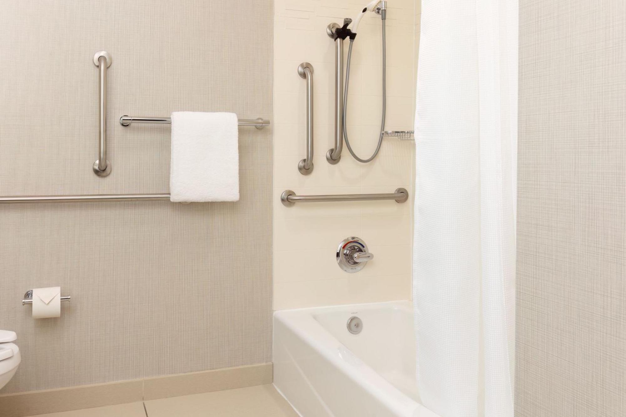 King Suite with Bath Tub and Sofa Bed - Mobility Accessible,1580790635:JPEG